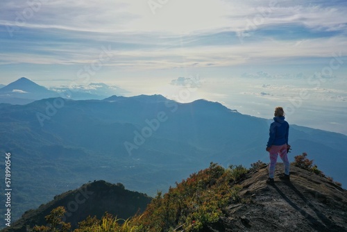 Epic panoramic view of Fores from the top of Mount Inerie, the view a mountain landscape, in the foreground a person.