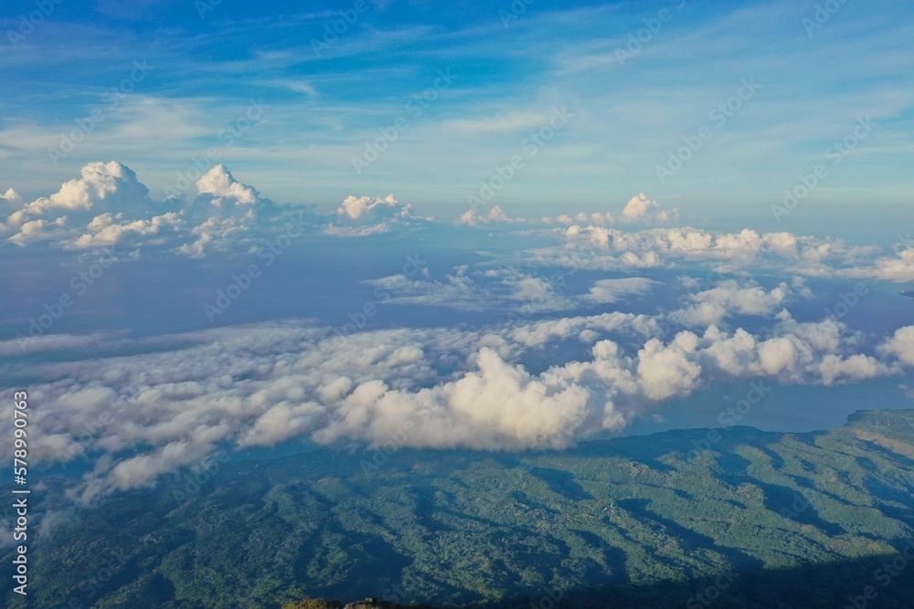 Epic panoramic view from the top of Mount Inerie on Fores, the view a green valley surrounded by a sea of clouds.