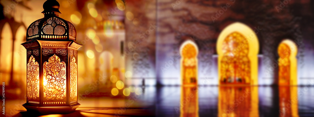 ornamental Arabic lantern and mosque in background ornamental Arabic lantern and mosque in background