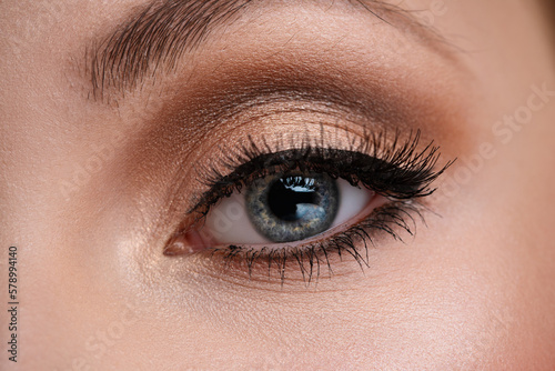Fototapeta Naklejka Na Ścianę i Meble -  Woman eye with make-up close-up view