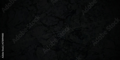 Dark black on dark texture chalkboard and blackboard backdrop background. Black or dark gray rough grainy concrete wall stone texture background. Textured of stone grunge on black grunge background.