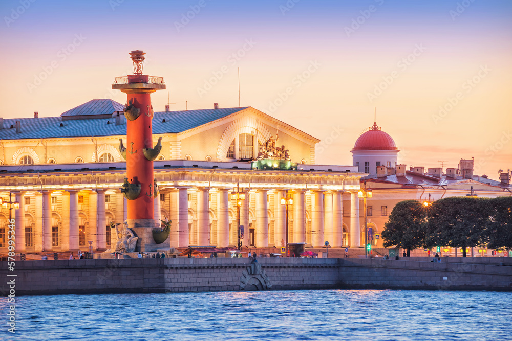 Rostral columns and Stock Exchange in evening illumination, St. Petersburg