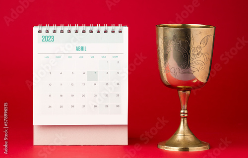 April month calendar with Christian chalice cup commemorating the death of Christ, Holy Week
