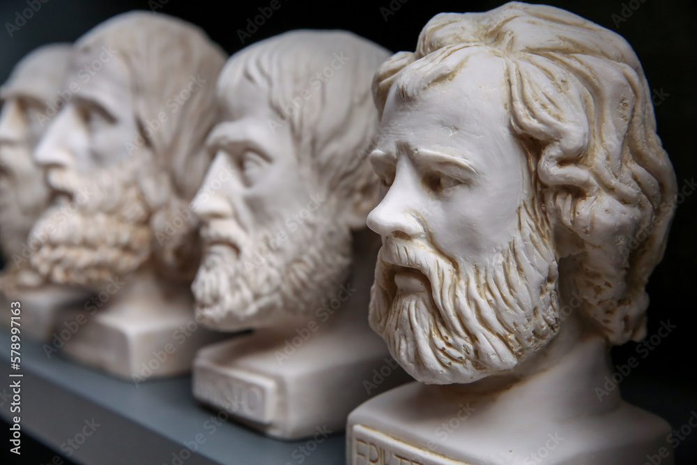 Obraz premium Plaster busts of classical greek writers and philosophers. Portraits of ancient historical persons. Mass-product souvenir in Turkey. Copy space, selected focus