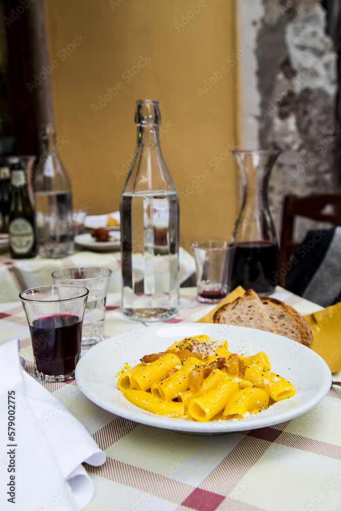 Eating pasta carbonare with guanciale in rome italy Eating pasta carbonare with guanciale in rome italy