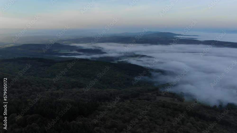 Low clouds over rural landscape at sunset. Aerial drone panoramic view and sky for copy space Low clouds over rural landscape at sunset. Aerial drone panoramic view and sky for copy space
