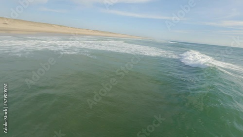 Wallpaper Mural Drone flying around isolated surfer surfing wave, Soustons in Landes department, France. Aerial fpv Torontodigital.ca