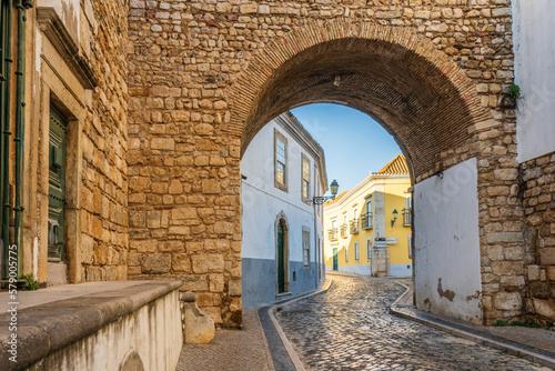 Resting Arch in medieval walls is one of 4 entrances to the old town in Faro, Algarve, Portugal