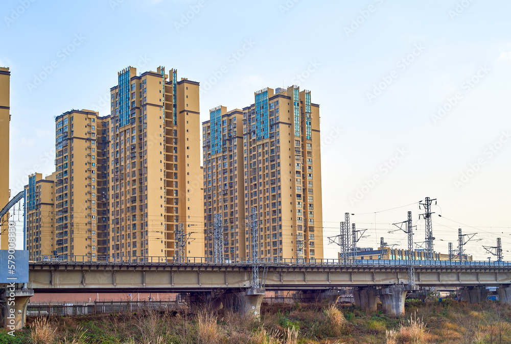 A tall building next to the high-speed railway line in Chengdu, China
