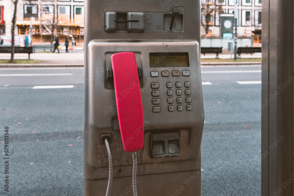 Telephone booth on the streets of Berlin, pink telephone. Category urban photography. Telephone booth on the streets of Berlin, pink telephone. Category urban photography.