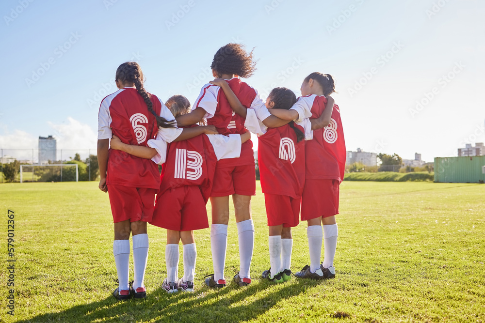 Fototapeta premium Diversity, sports girl and soccer field training for youth competition match playing at stadium grass. Young athlete, standing or player enjoy football teamwork or support world cup championship game