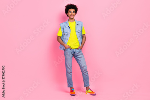Full length photo of optimistic extravagant man dressed new collection clothes outfit empty space isolated on pink color background