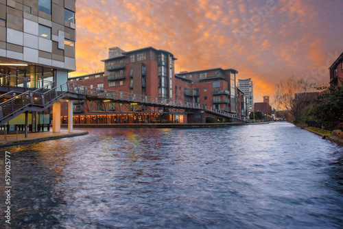 Sunset and brick buildings alongside a water canal in the central Birmingham, England © Marius Igas