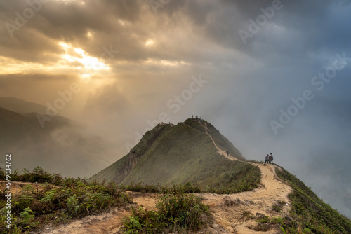 The majestic panoramic image of Ta Xua mountain. Visitors can experience on the trail like the back of a dinosaur and the top of Ta Xua mountain. This is a very famous tourist destination in Son La.VN photo