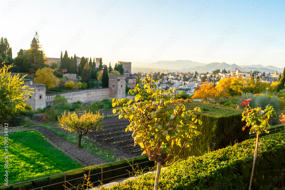 Sunset over ancieat arabic Alhambra in Granada, Spain on November 26, 2022
