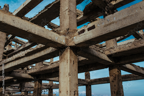 Abandoned concrete structure on blue sky background