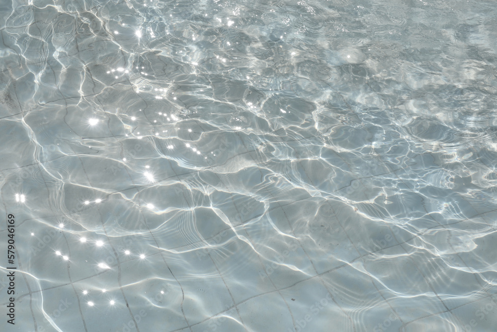 the texture of the water in the pool, the shine from the waves