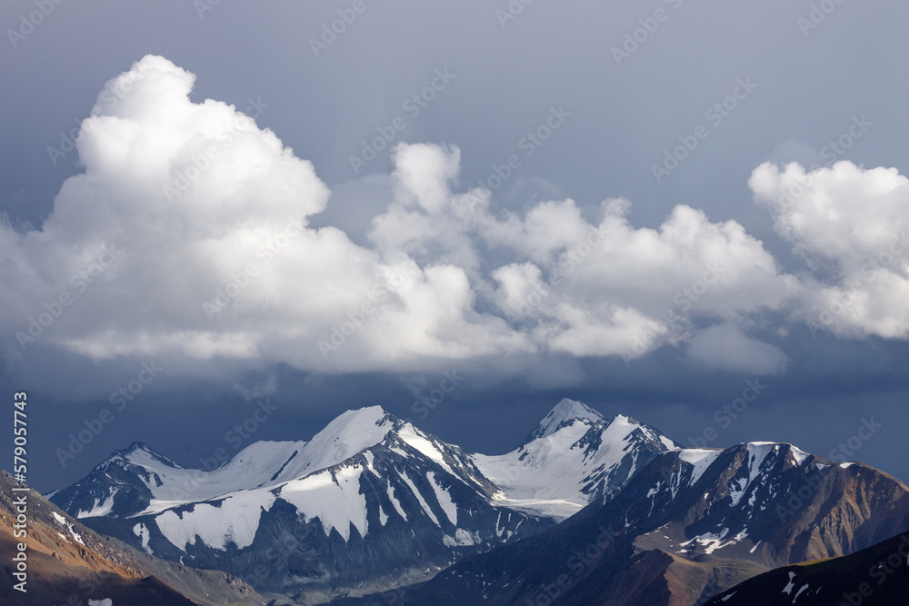 Magical mountain landscape with dramatic sky.