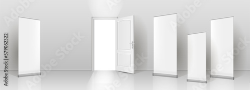 The interior of an empty room with a white banner and an open door.
Free space for copying, 3d vector image.