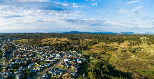 Edge of town residential area to creek and farmland paddock photo