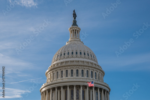 United States Capitol Dome with bright blue sky in background with copy space.