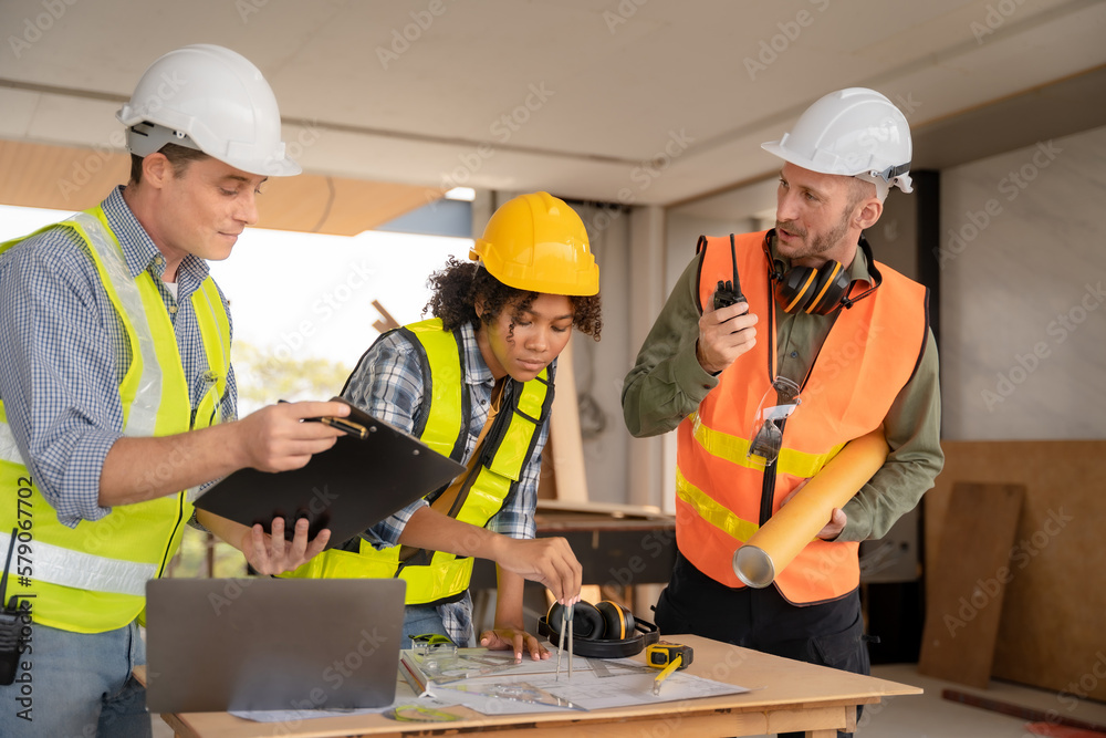 architect or engineer working on table use drawing tool on the paper plan for business architectural project. architect or engineer working on table use drawing tool on the paper plan for business architectural project.