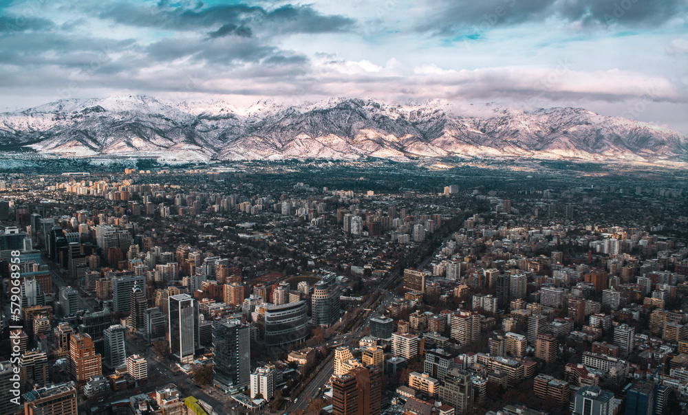 Santiago de Chile and the Andes mountains with snow at sunset