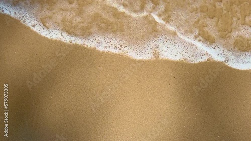 Small wave, text space. white sand beach, Ocean Wave On Sandy Beach