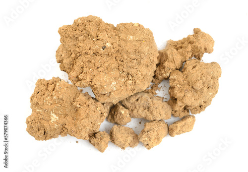 Clay is a type of fine-grained natural soil material. Isolated on white background.