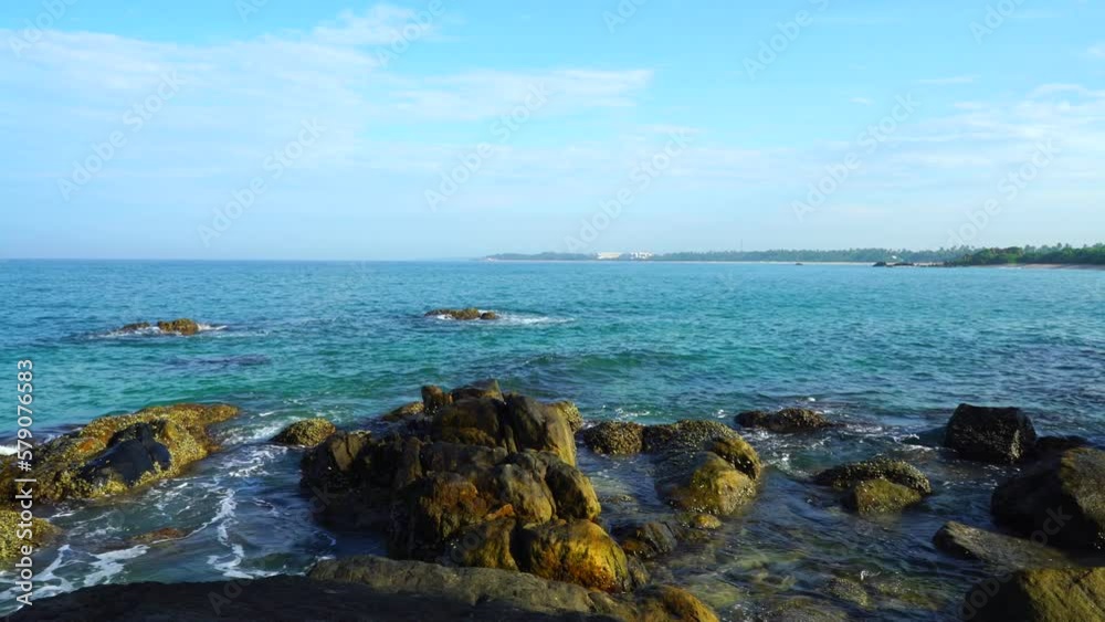 Seascape on rocky ocean coast and blue sky Seascape on rocky ocean coast and blue sky
