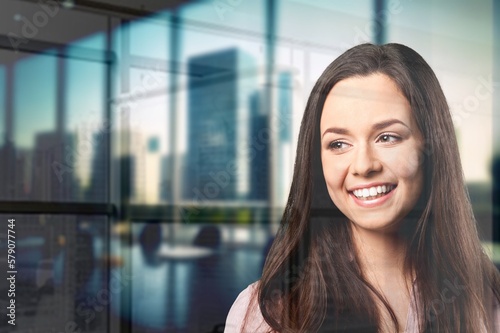 Successful Businesswoman Working in Office with City view