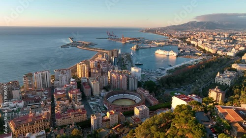 Malaga cityscape, Spain. Malaga waterfront, Plaza de Toros de Ronda bullring in Malaga, Spain.