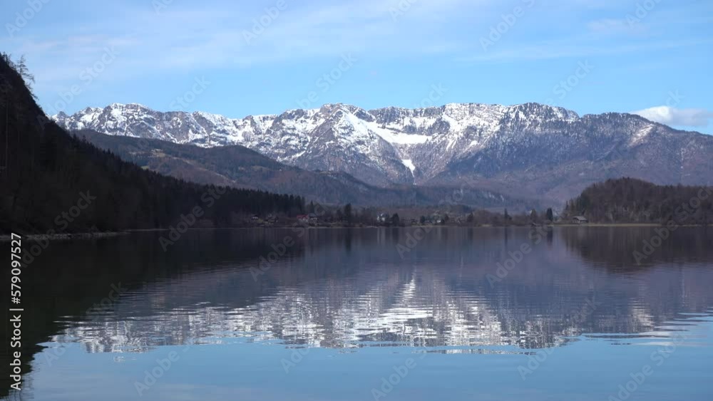 Bad Goisern, Austria - March 2023: Beautiful city view. Mountain Lake. Lake among the mountains. Huts in the mountains near the forest lake Bad Goisern, Austria - March 2023: Beautiful city view. Mountain Lake. Lake among the mountains. Huts in the mountains near the forest lake