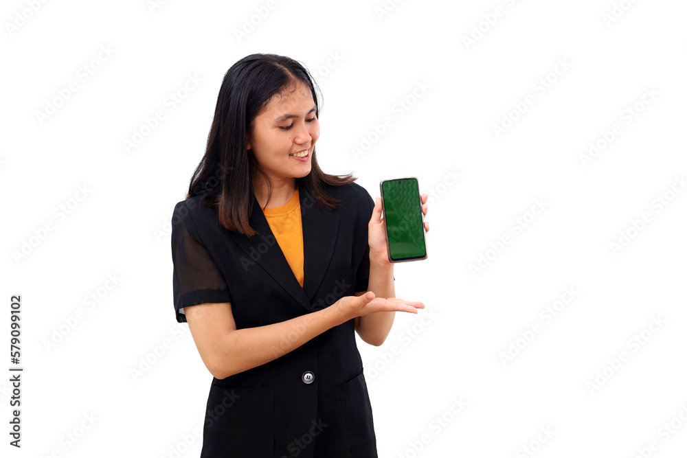 Happy young asian business woman standing while presenting blank cell phone display. Isolated Happy young asian business woman standing while presenting blank cell phone display. Isolated