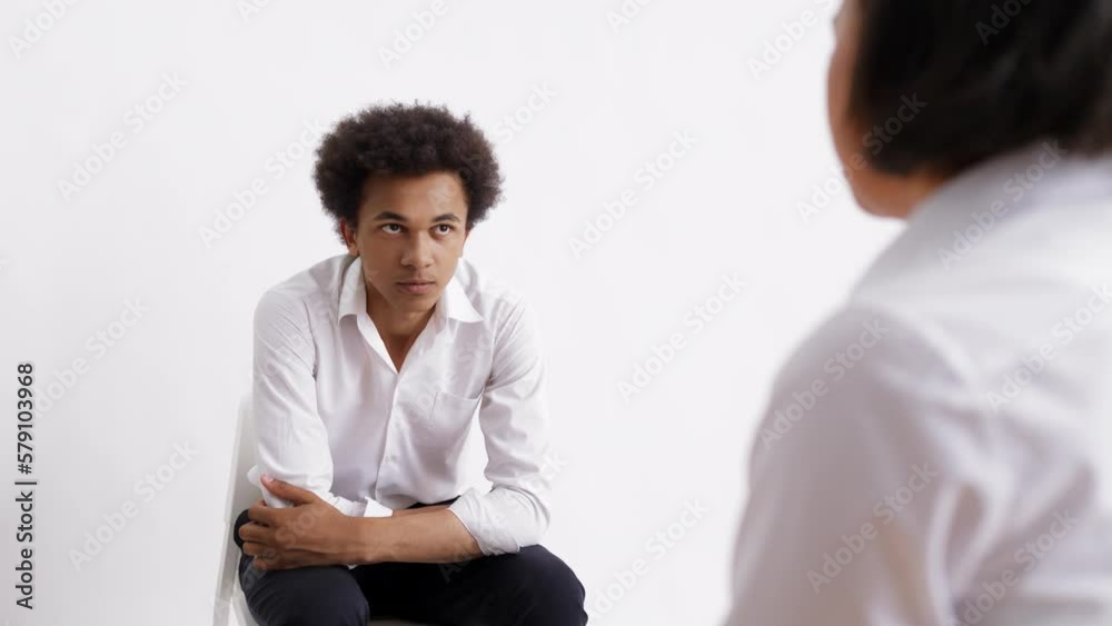 Man with mental health disorder having virtual reality meeting with psychiatrist Man with mental health disorder having virtual reality meeting with psychiatrist