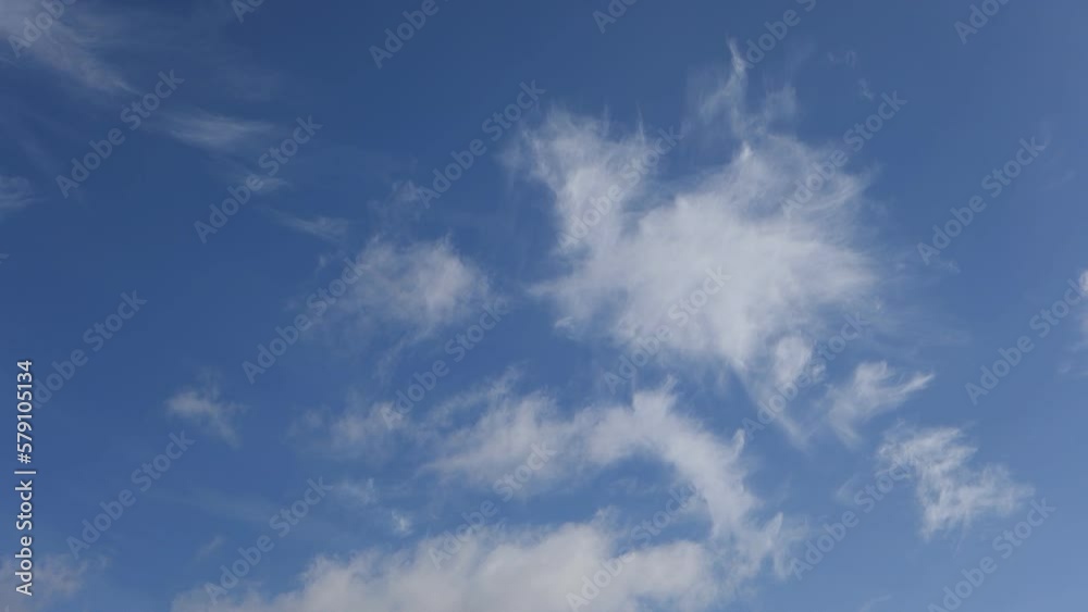 white clouds fast flying in the blue sky white clouds fast flying in the blue sky