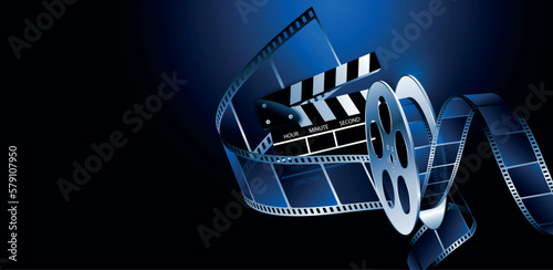 bobina cinema con pellicola, spettacolo, film, su sfondo blu	
 photo