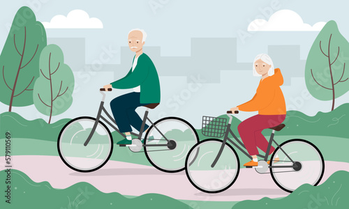 Senior man and woman riding bicycles in the city park. Old man and woman on bikes