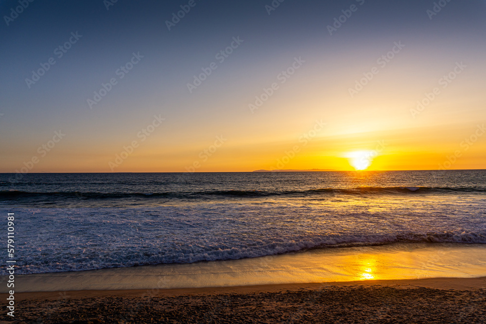 Beautiful glowing orange sunset in Laguna Beach, California