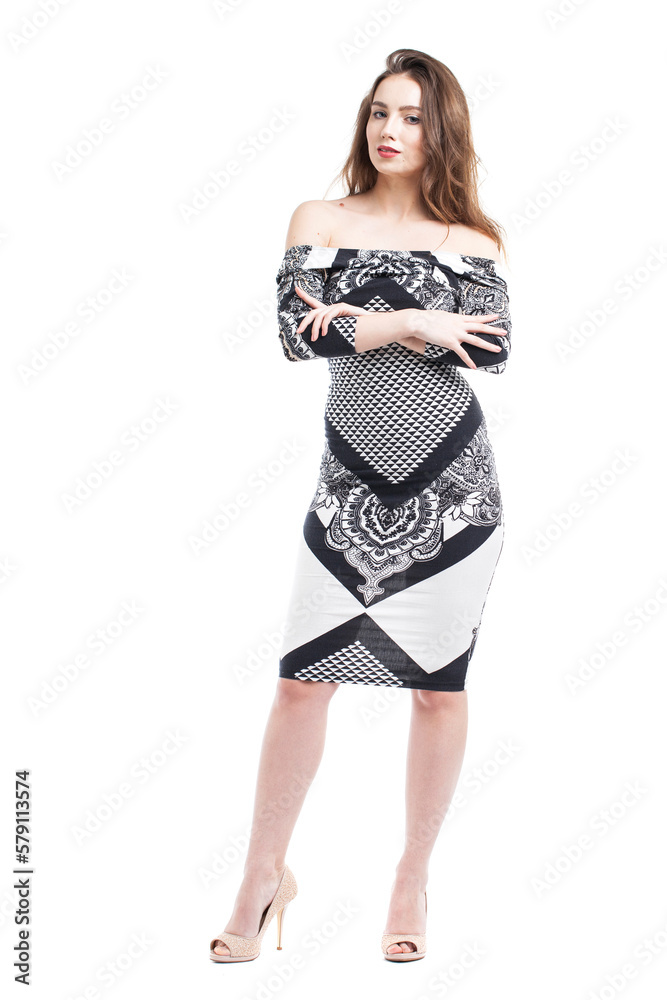 Beautiful young brunette woman in black and white dress, isolted on white background Beautiful young brunette woman in black and white dress, isolted on white background