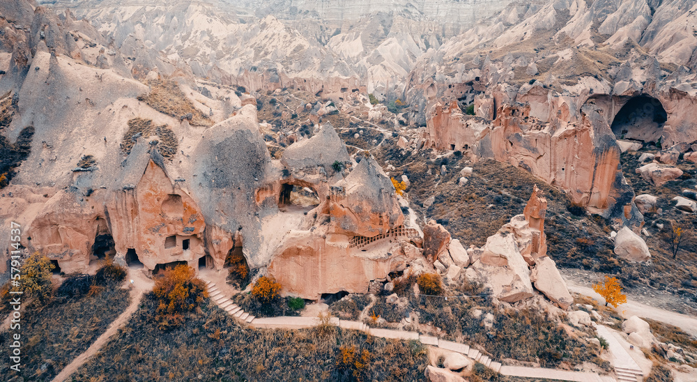 Cave house dwellings of Cappadocia, national park Goreme of Nevsehir Turkey, aerial drone view - obrazy, fototapety, plakaty 