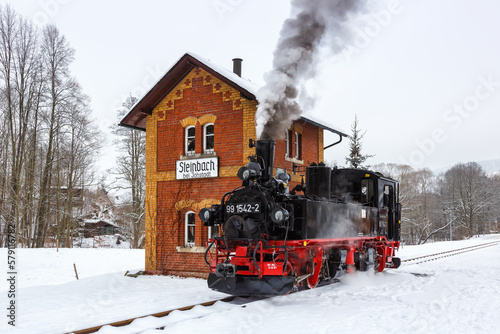 Pressnitztalbahn steam train locomotive railway in winter in Steinbach, Germany photo