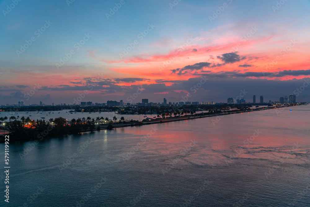 landscape of Miami port before sunrise, tropical seacoast under twilight