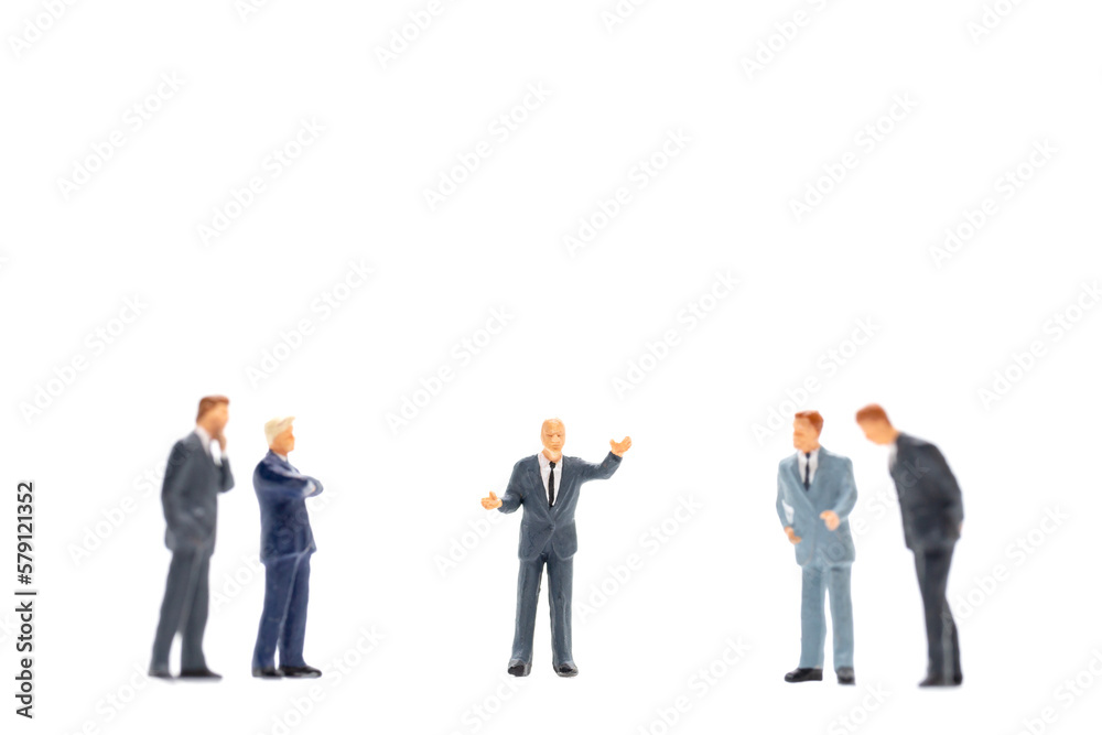 Miniature people, Businessman standing on white background