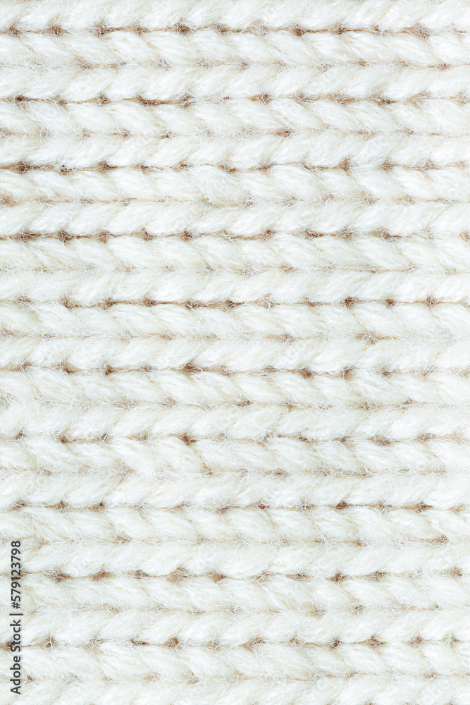Macro knit sweater texture,White knitted texture and background. Macro knit sweater texture,White knitted texture and background.
