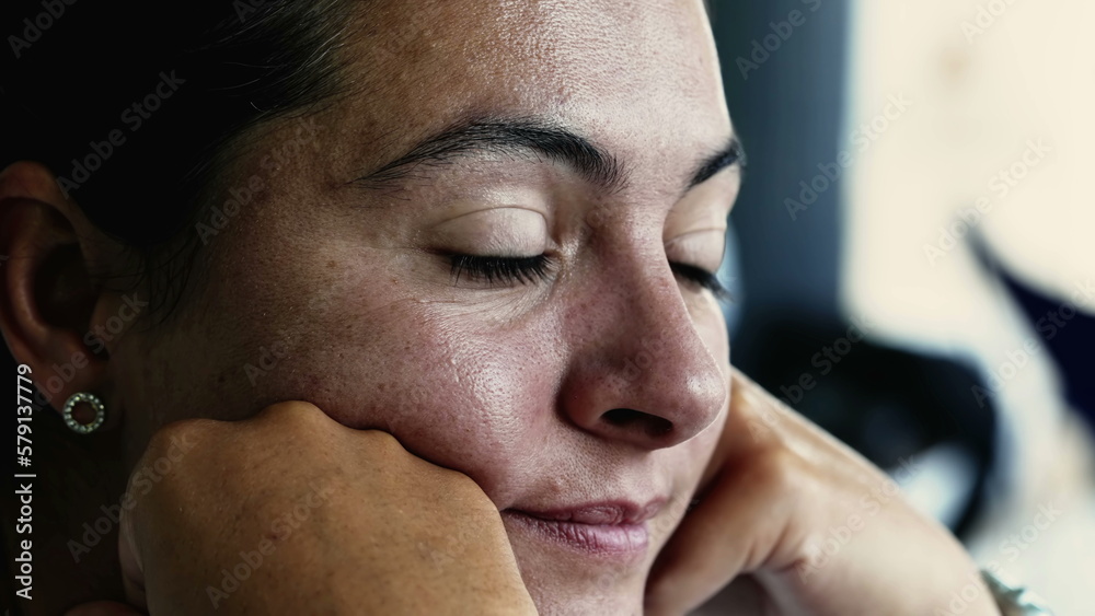 Fototapeta premium One tearful woman face lost in thought. Sad pensive emotion of a person staring at horizon with thougtful expression suffering from depression