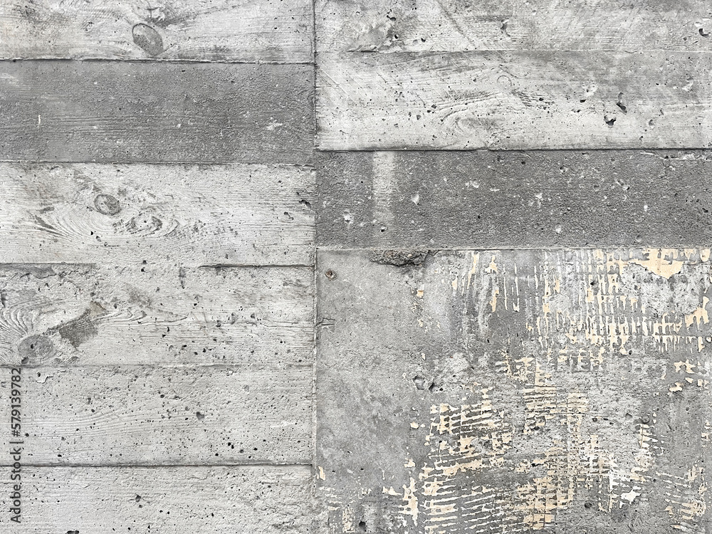 Fototapeta premium fragment of urban concrete wall of a building or fence. Concrete texture. Pattern or wallpaper