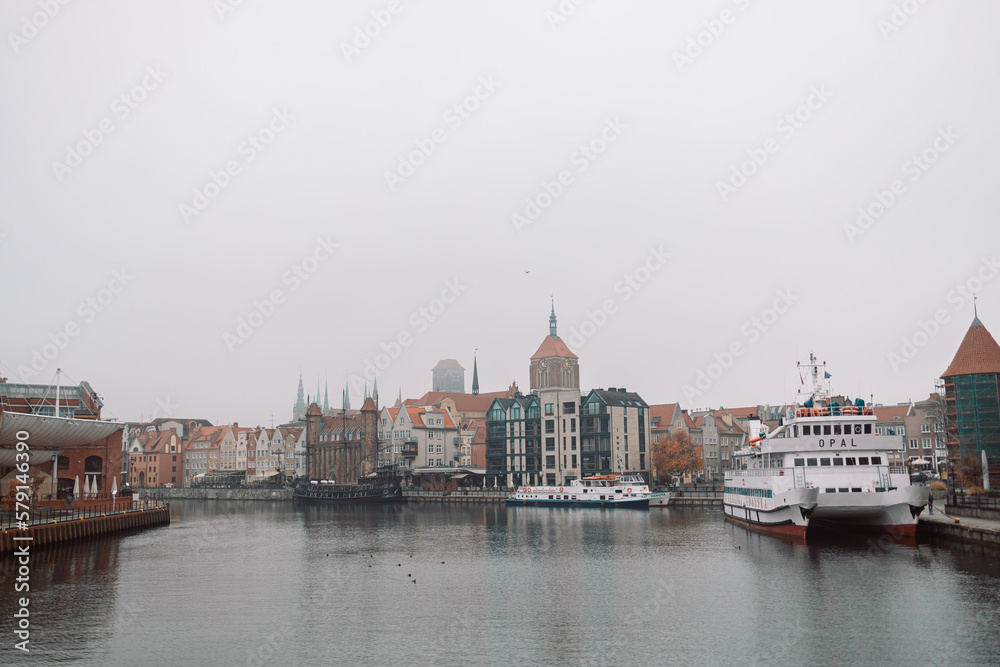 Beautiful Gdansk over the Motlawa river at fog. Poland. High quality FullHD footage