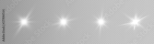 A set of white glowing light on a transparent background  white sun rays  bright stars with rays and highlights. Vector 10 eps