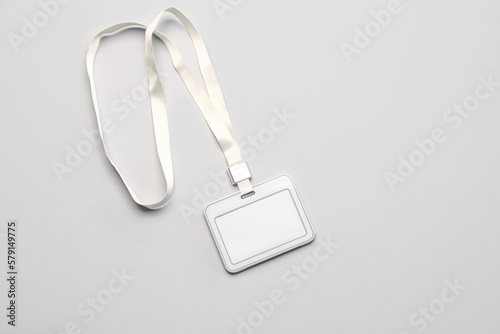 Blank badge with lanyard on light background